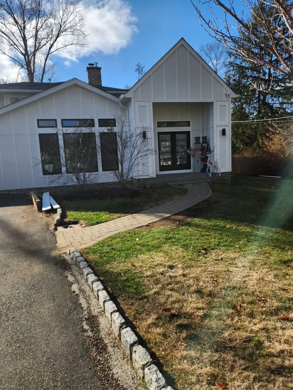 Finished board-and-batten addition and front walk